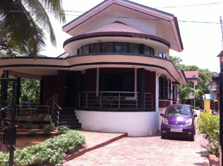 The huge bungalow dwarfing the little Nano Twist